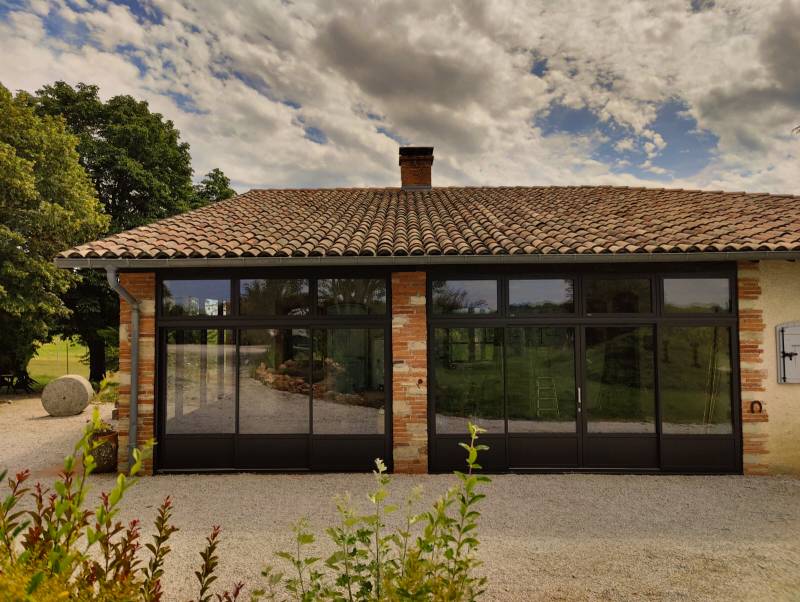 fermeture de terrasse en aluminium sur mesure à Albi: une extension lumineuse et moderne pour votre maison